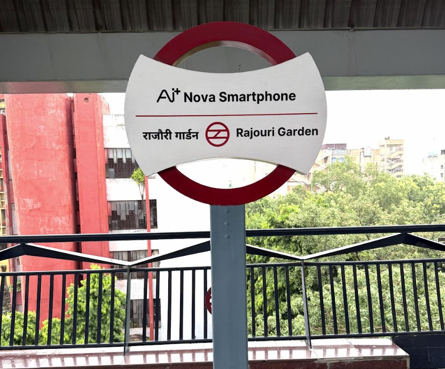 Ai+ NOVA Smartphone branding at Rajouri Garden Metro Station, Delhi