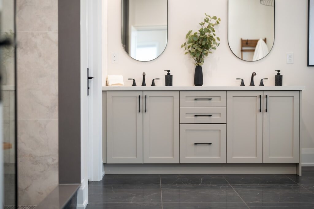 Modern bathroom vanity with twin basins, mirrors and chrome fittings